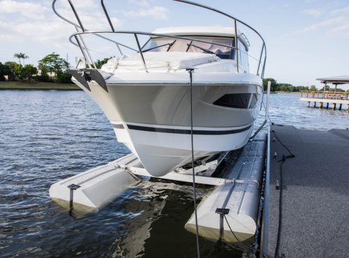 Boat on boat lift by the water